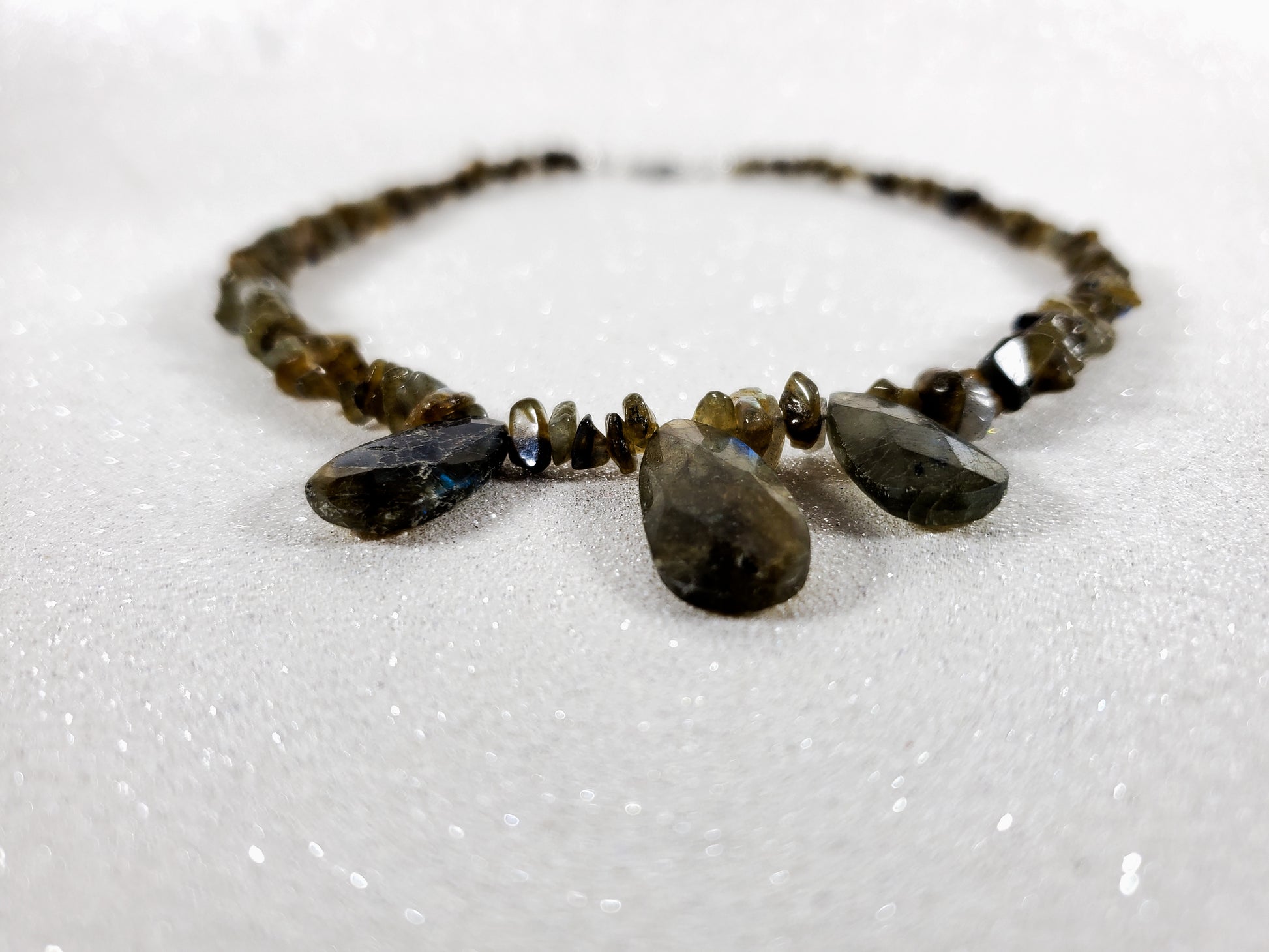 Necklace with Labradorite stones on a white background