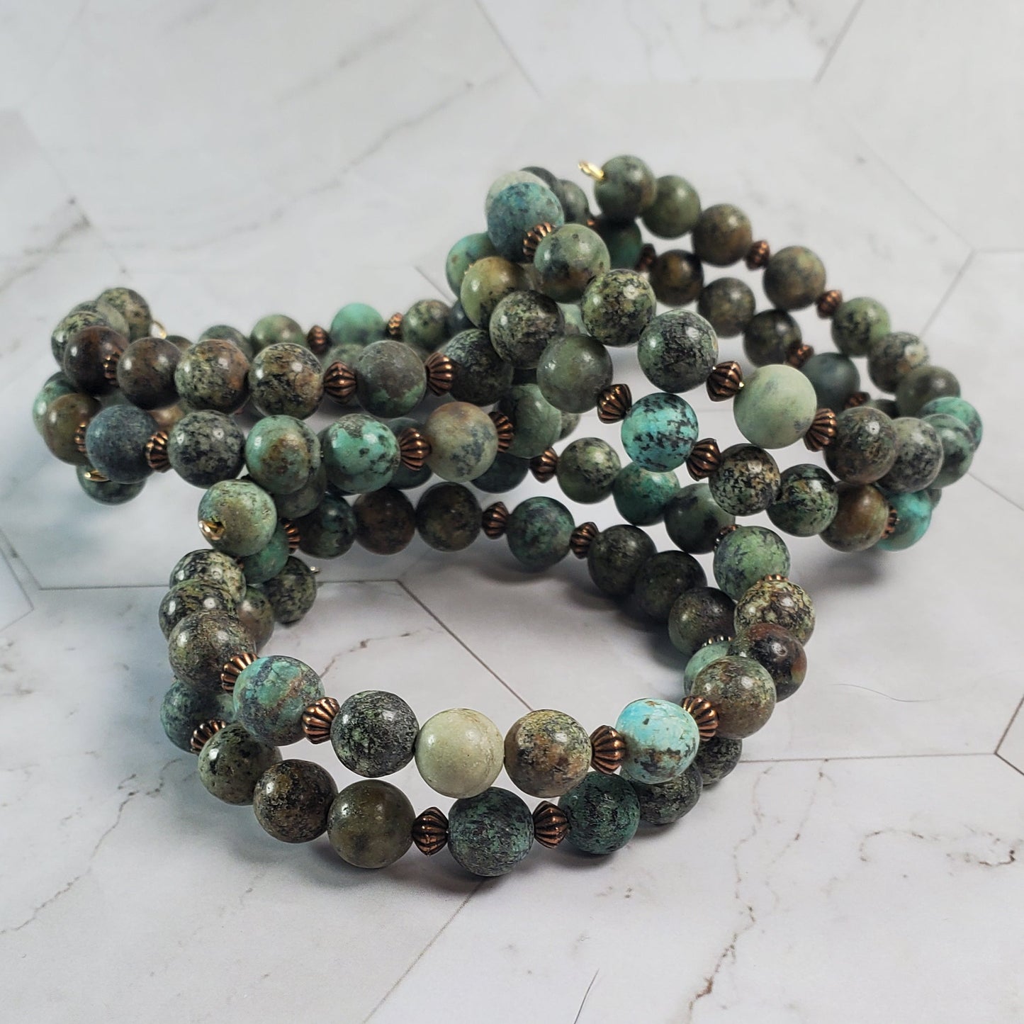 Beaded bracelet on a marble surface