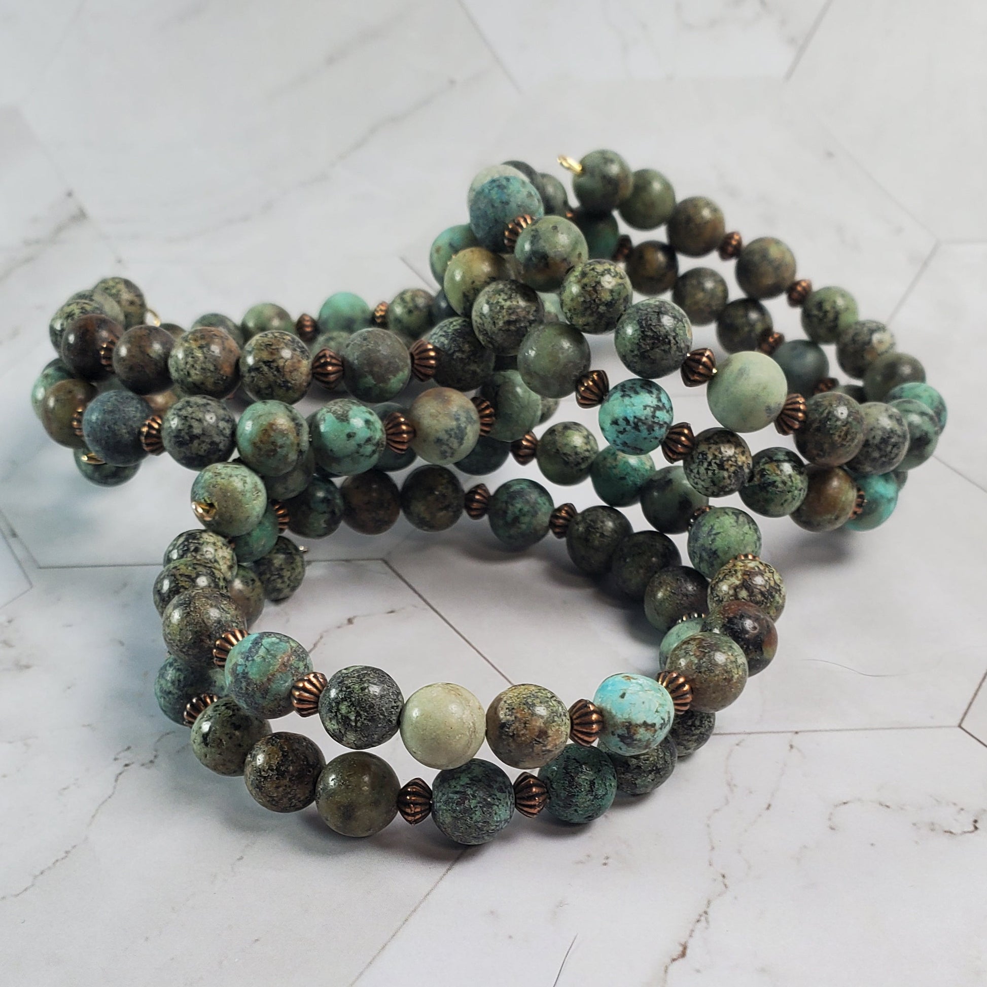 Beaded bracelet on a marble surface