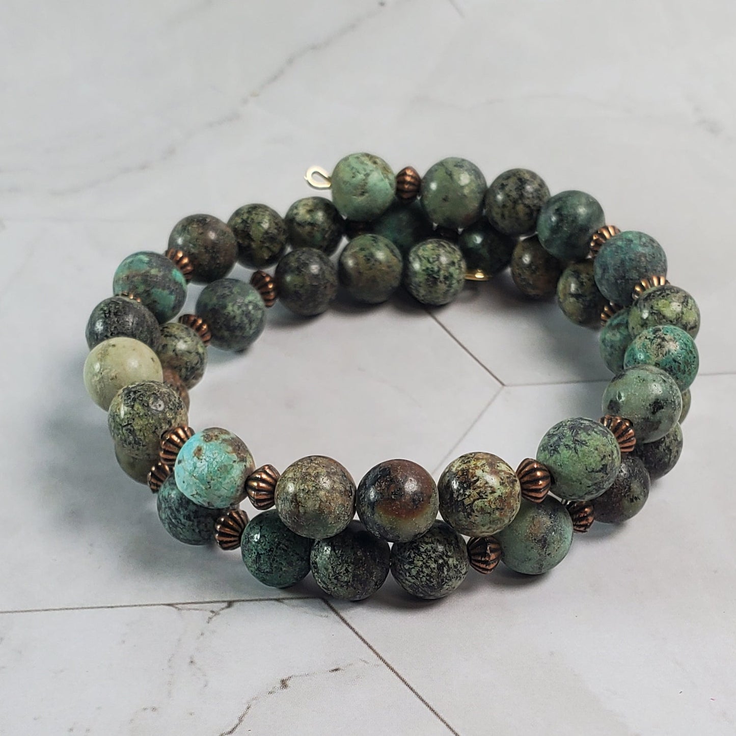 Beaded bracelet on a marble surface
