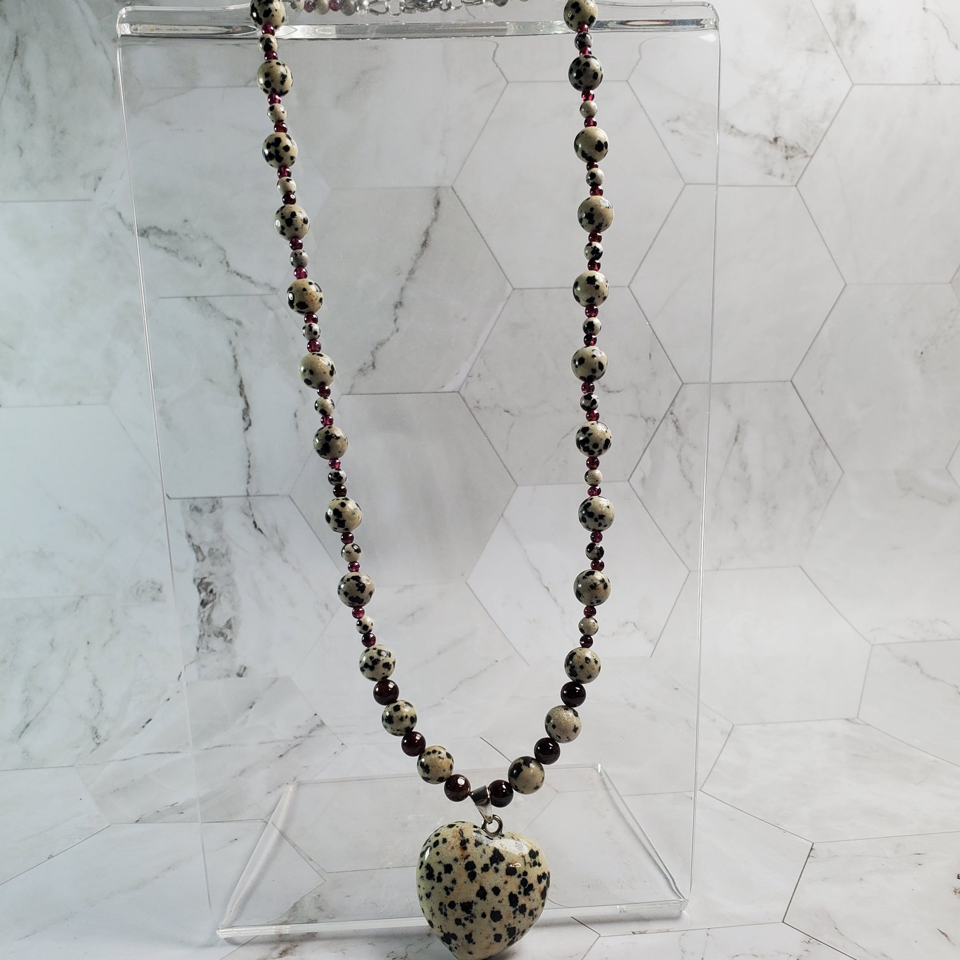 Necklace with decorative elements on a marble background