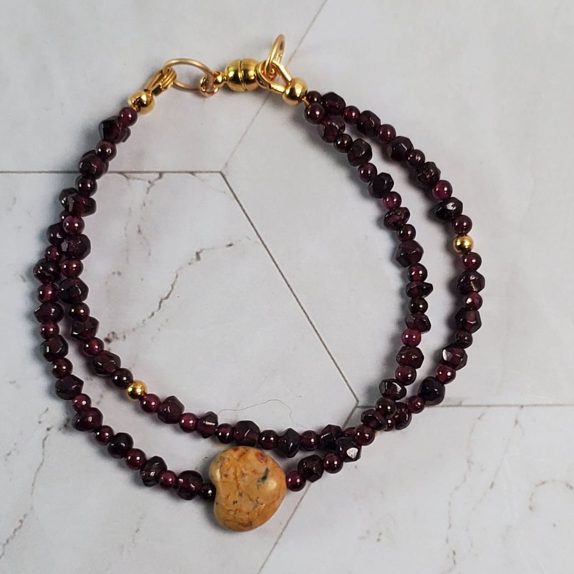 Beaded bracelet on a marble surface