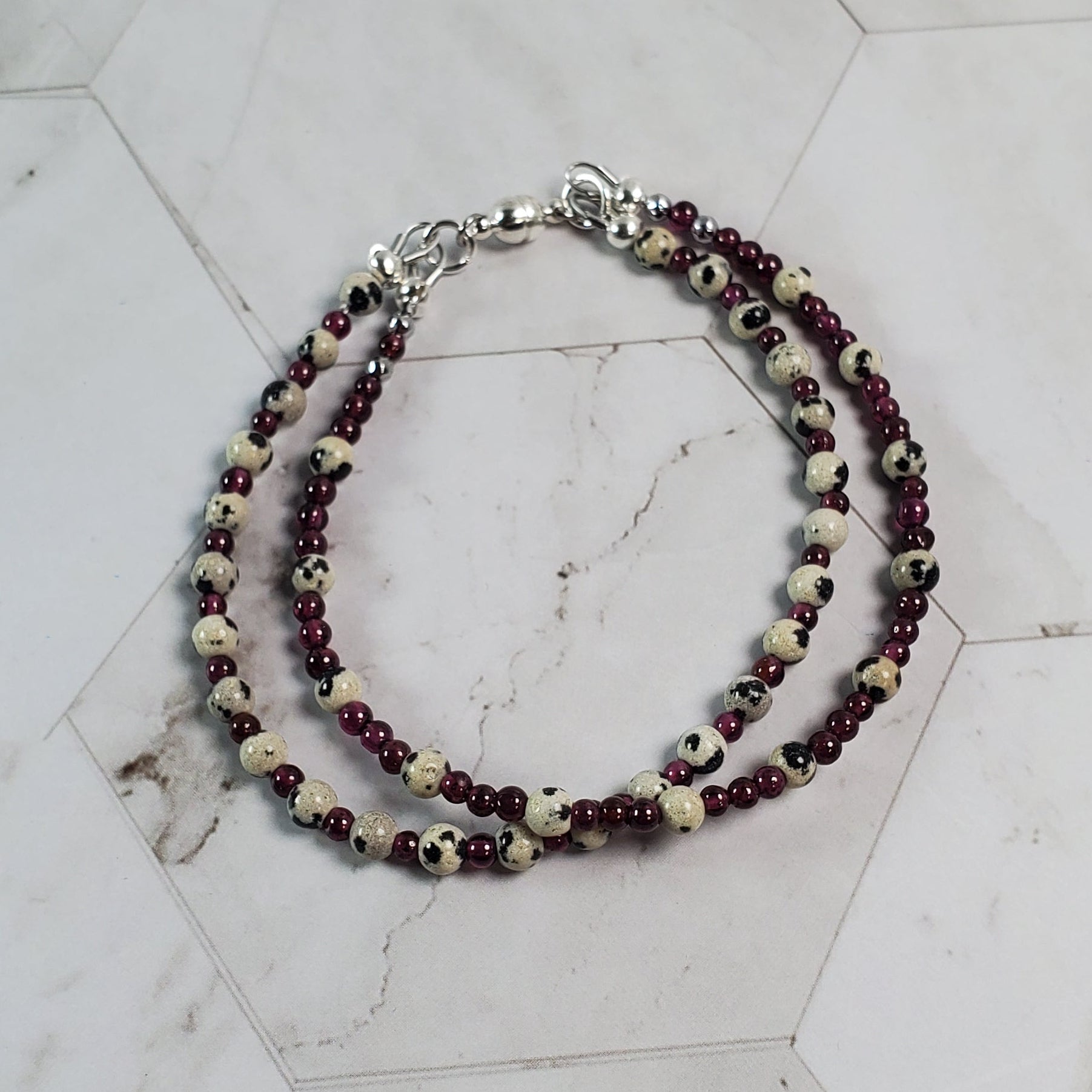 Two strand beaded bracelet on a marble surface