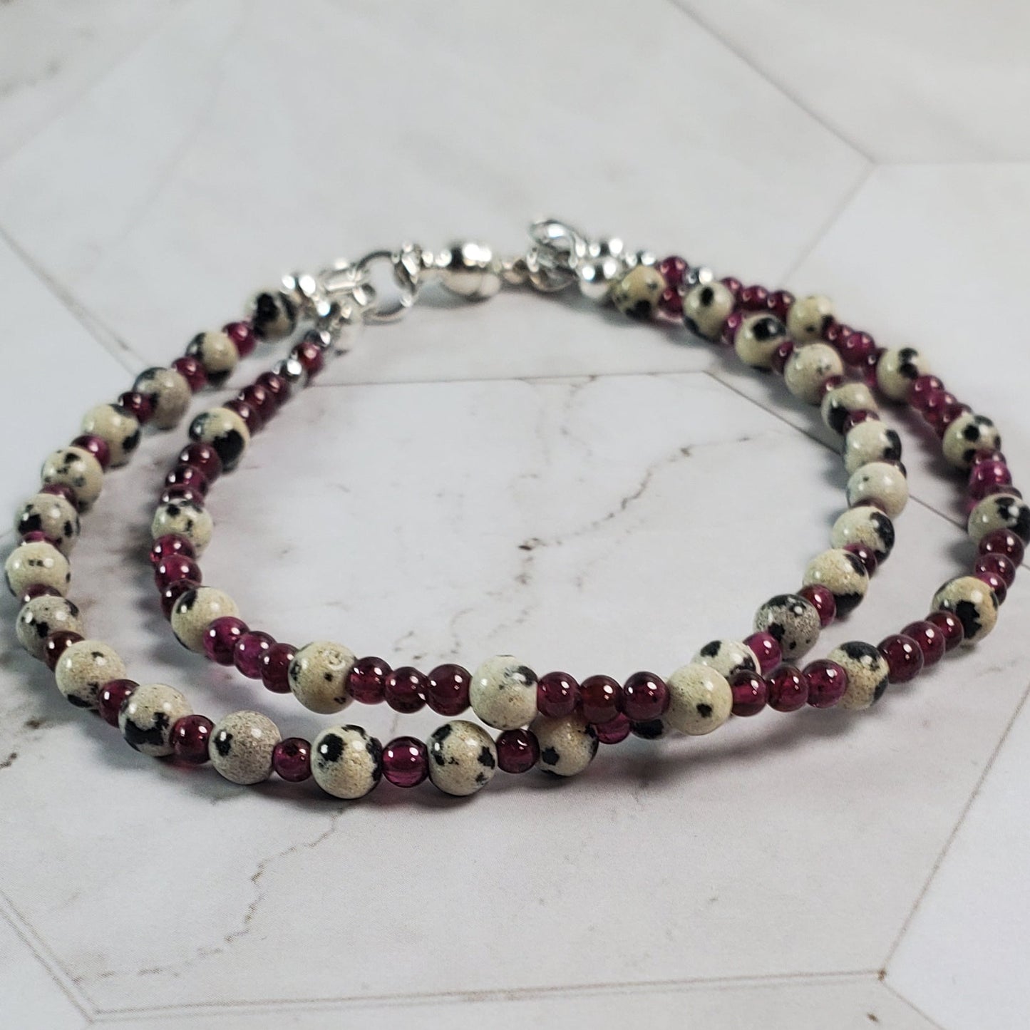 Beaded bracelet on a marble floor