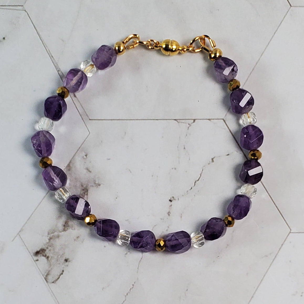 Beaded bracelet on a marble surface