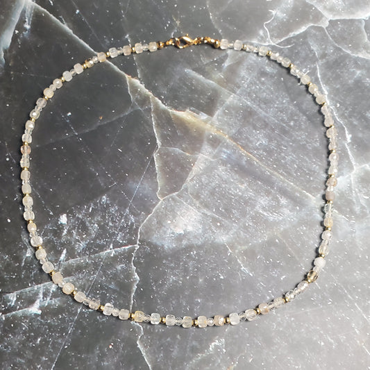 Topaz beaded bracelet on a dark marble surface