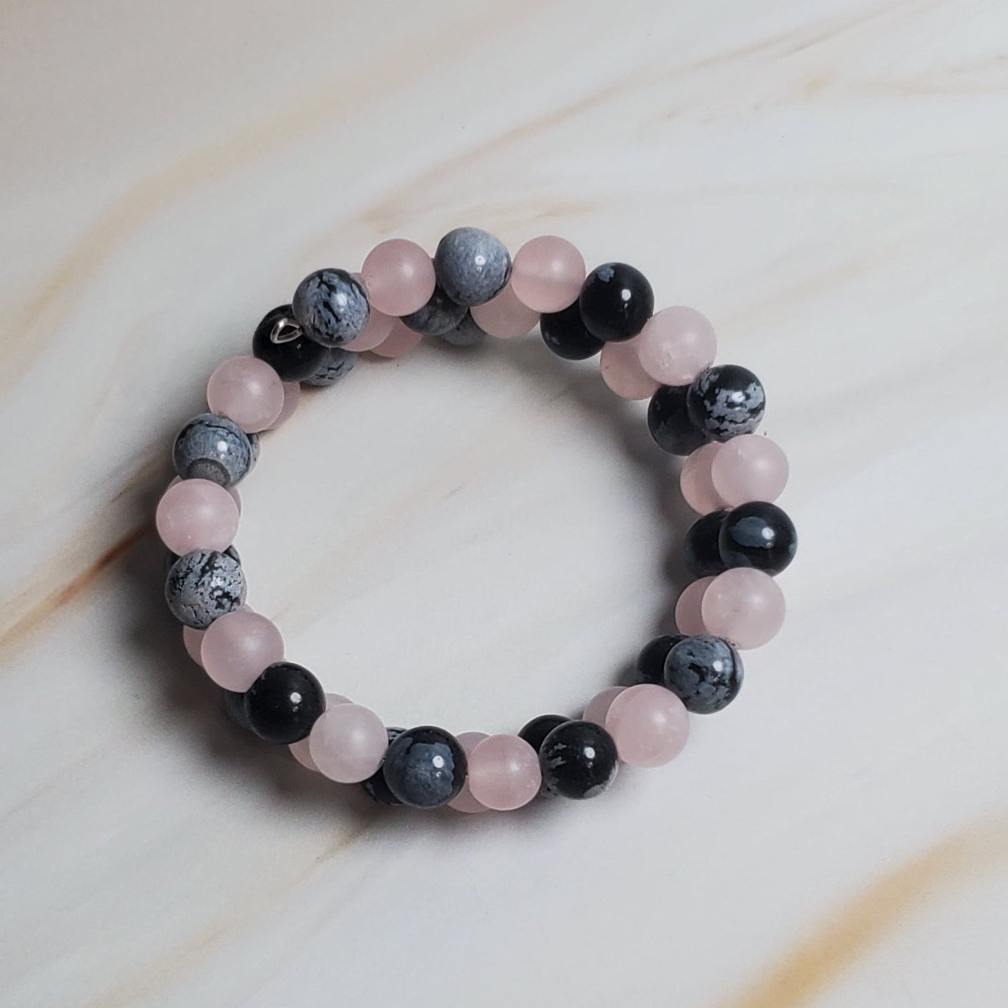 Beaded bracelet on a marble surface