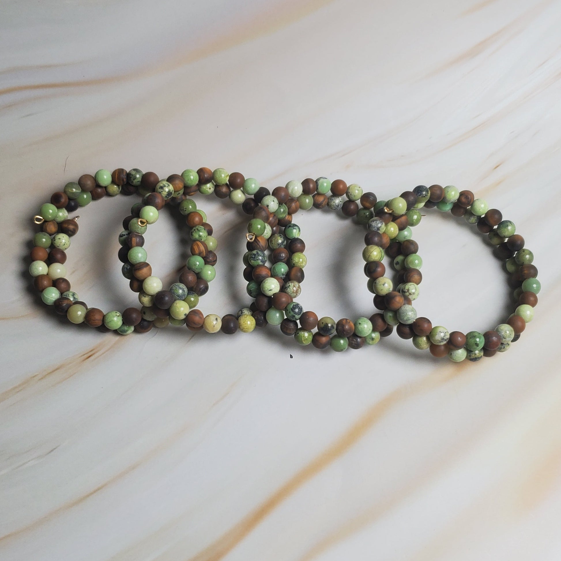 Beaded bracelets on a marble surface