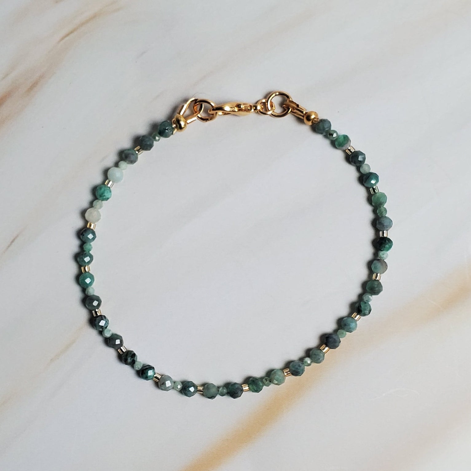 Beaded bracelet on a soft fabric background