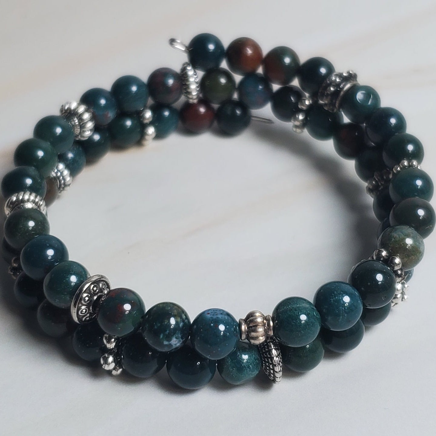Beaded bracelet on a white fabric background