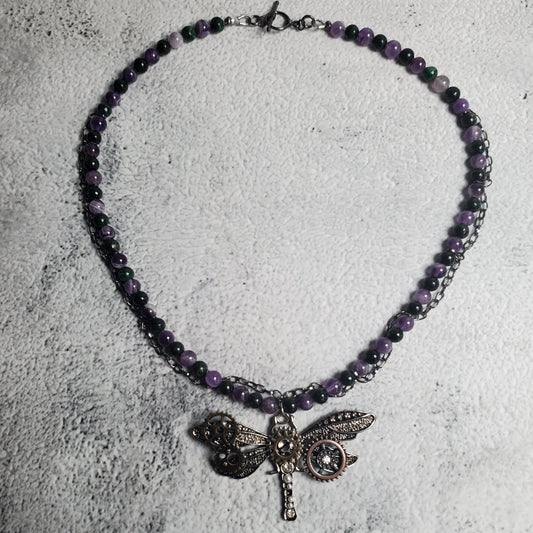 Industrial style necklace with mechanical dragonfly pendant and amethyst gemstones on gunmetal chain