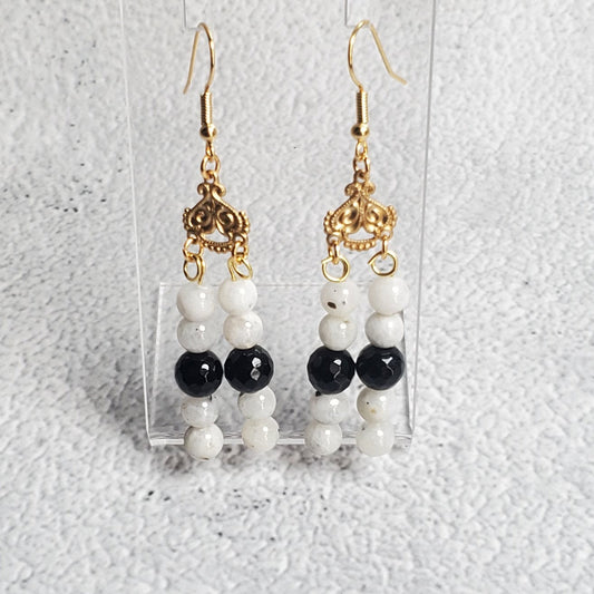 Elegant gemstone earrings with white Moonstone and black Onyx chandelier design