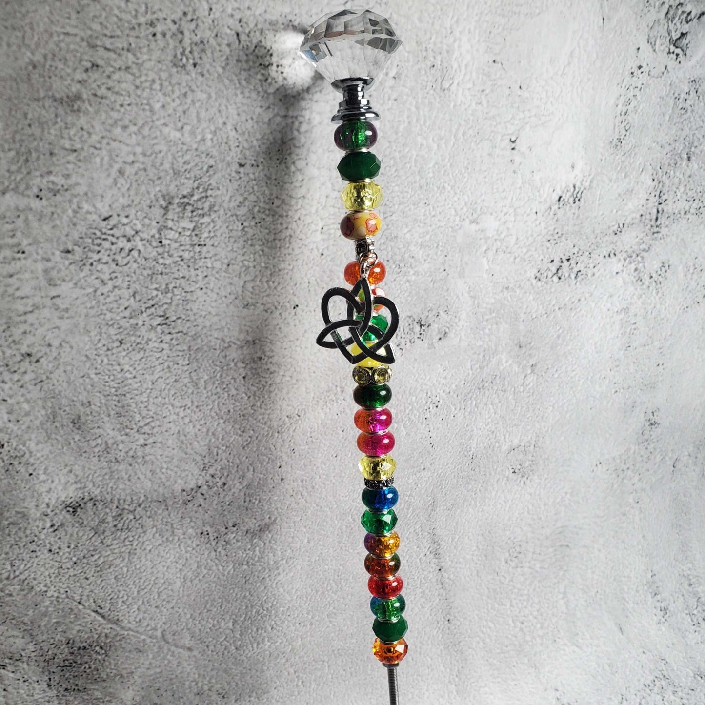 Handcrafted Celtic Fairy Wand with colorful charm beads, pewter knot heart, and crystal knob for garden decor