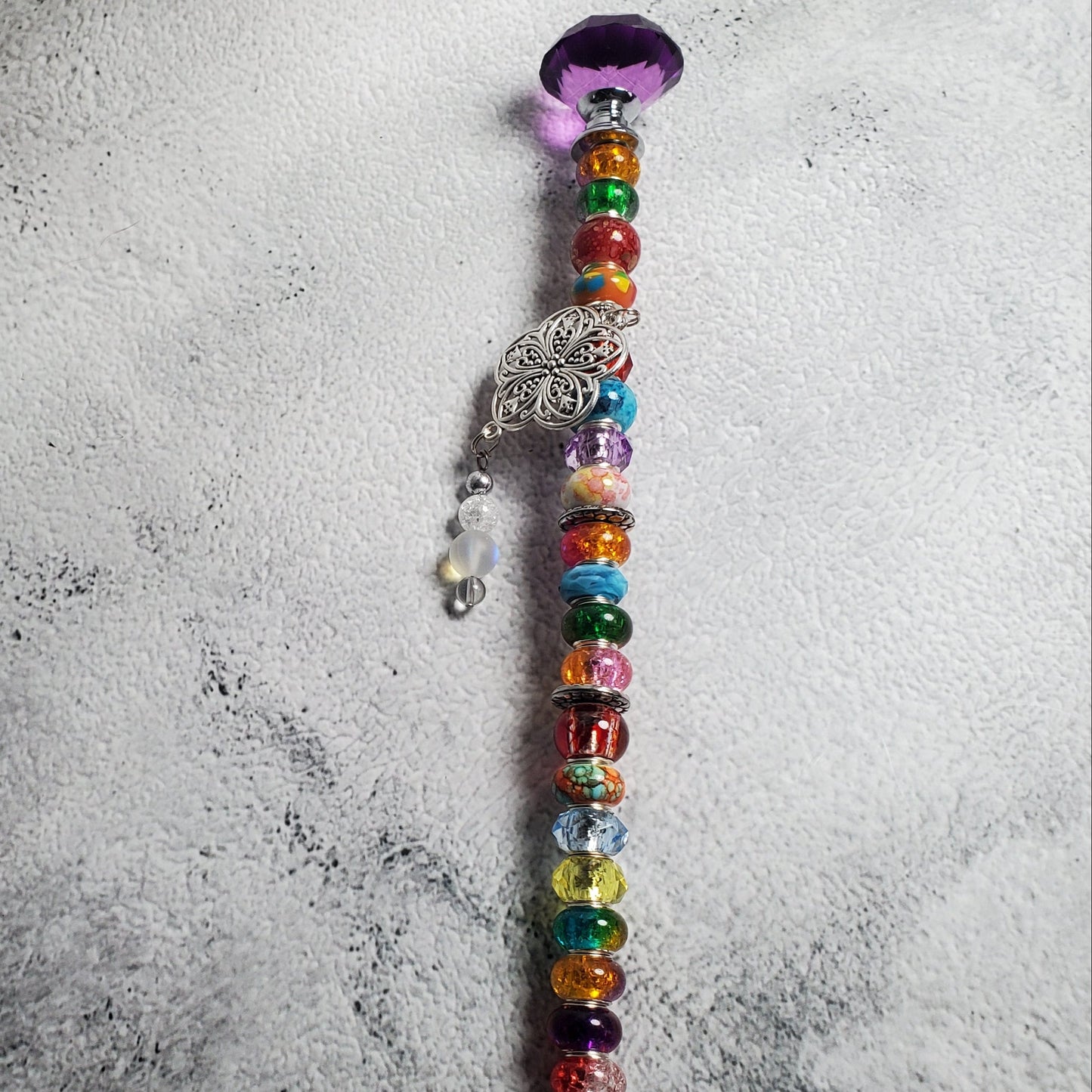 Handcrafted 12-inch Fairy Wand garden stake with floral accents, vibrant beads, and sparkling crystal knob for whimsical outdoor décor