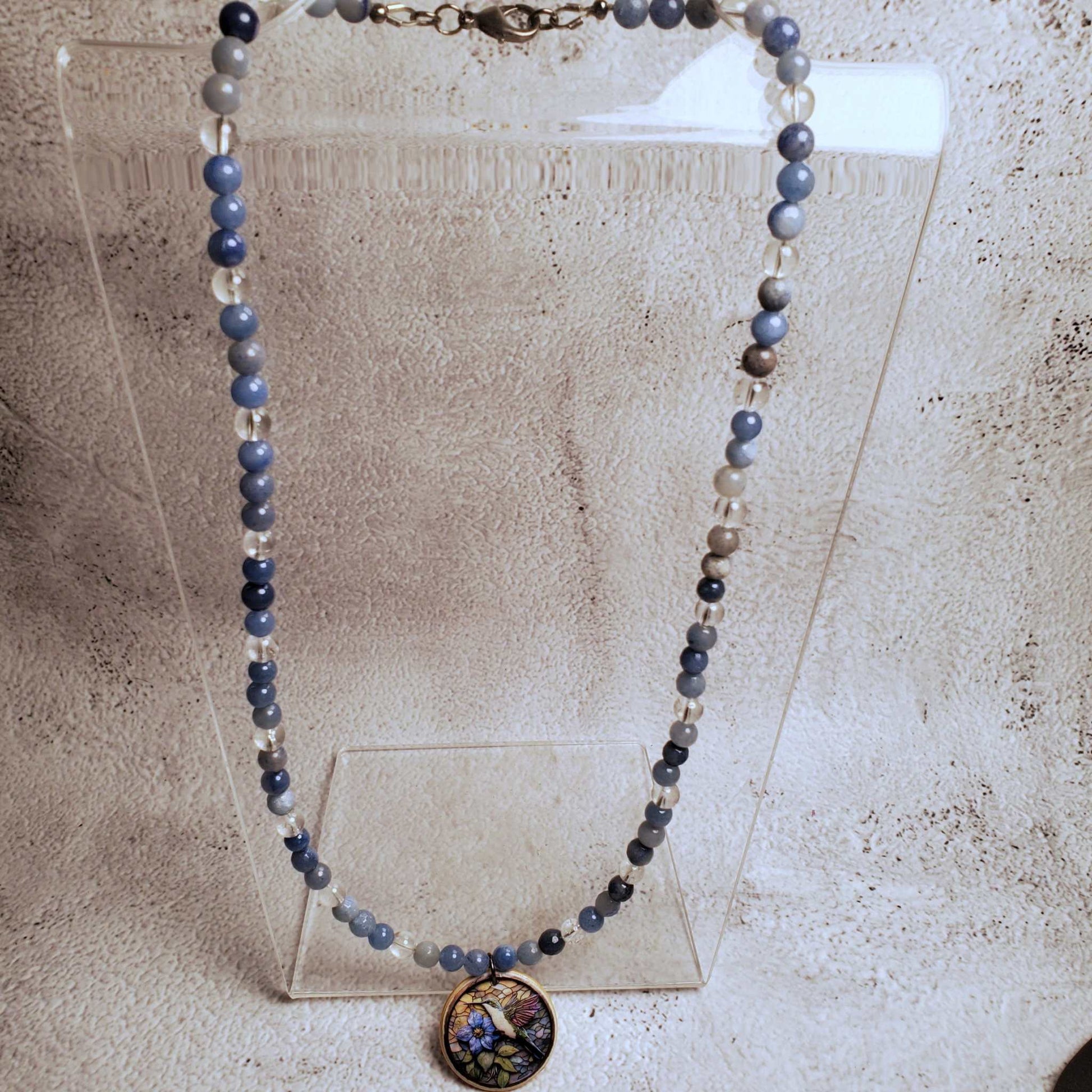 Handcrafted Blue Aventurine and Clear Quartz necklace with hand-painted floral wood pendant on 20-inch chain