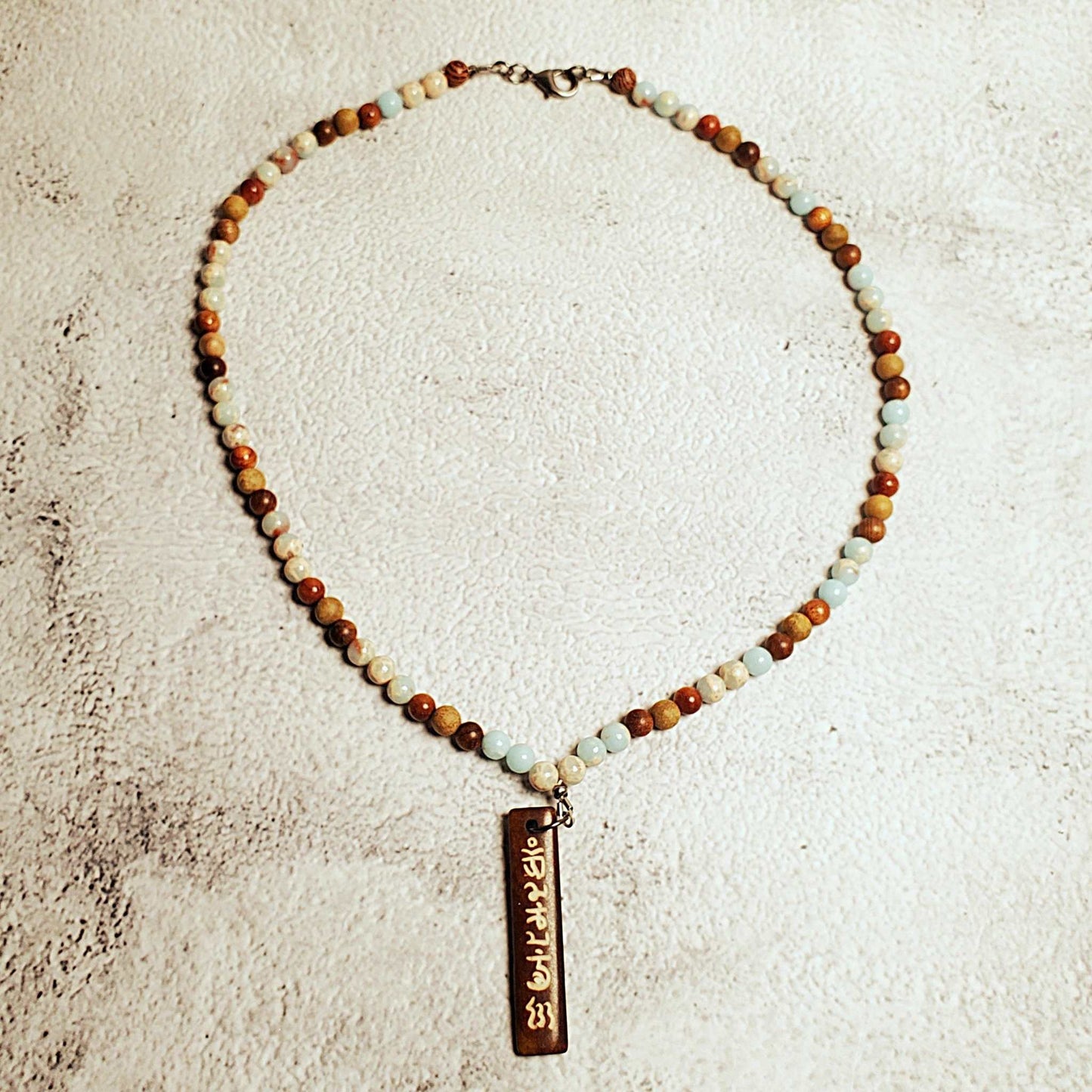 Handcrafted gemstone necklace with Aquaterra Impression Jasper beads and wood Tibetan pendant