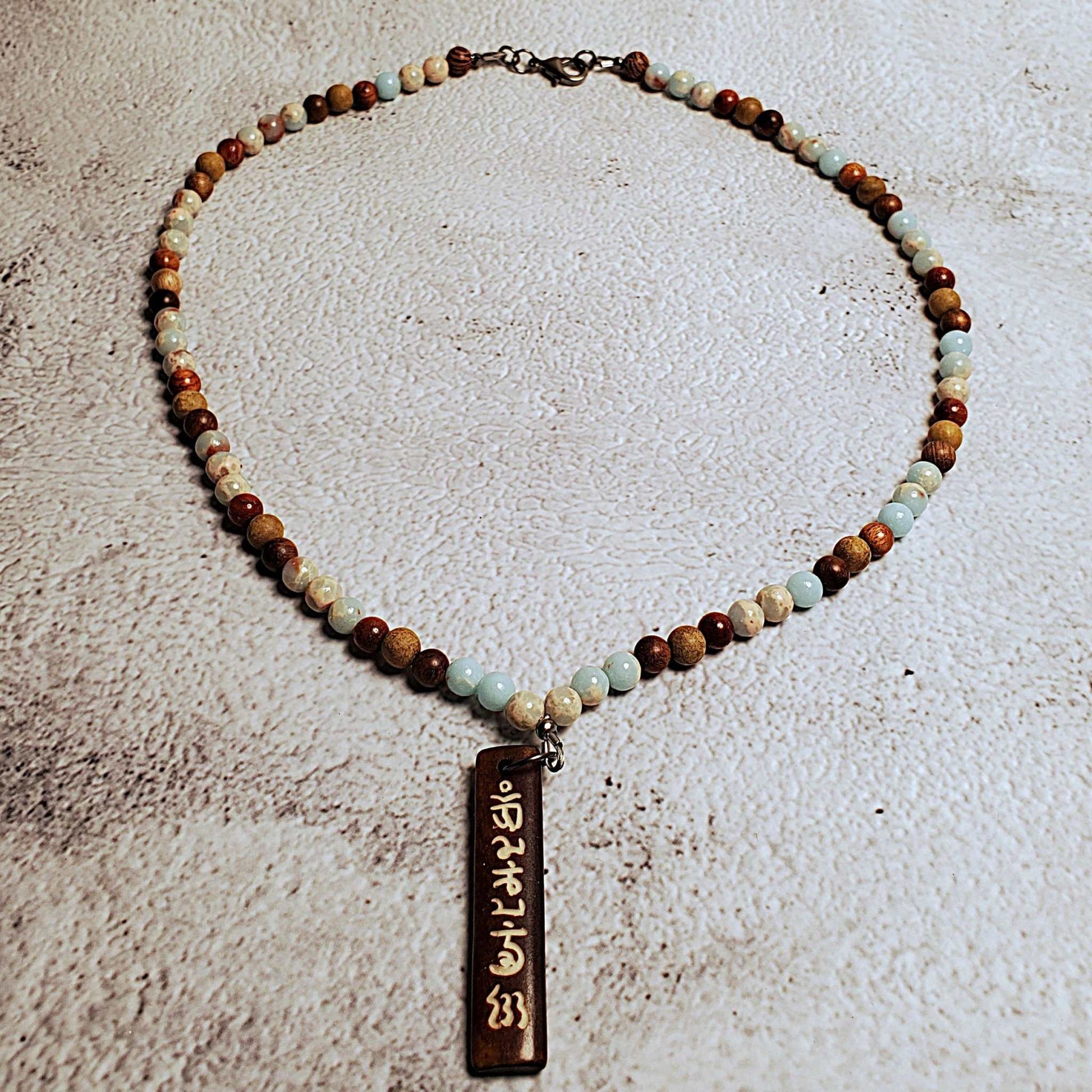 Handcrafted gemstone necklace with Aquaterra Impression Jasper beads and wood Tibetan prayer pendant