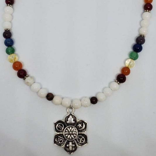 Colorful gemstone necklace with a pewter coexist pendant and white, blue, green, orange, and red beads