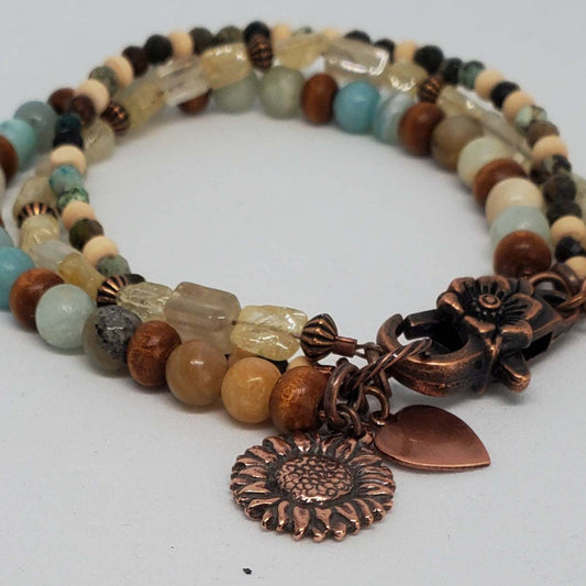 Boho triple-strand charm bracelet with natural Citrine, Turquoise, Amazonite, wood beads, and copper sunflower charm clasp