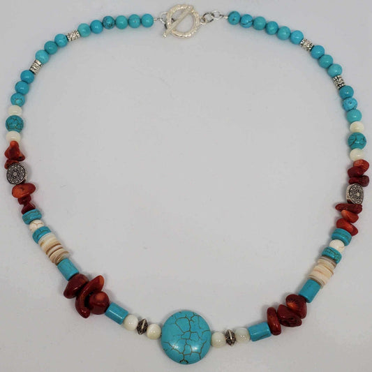 Southwestern-inspired gemstone necklace with turquoise howlite, coral chips, mother of pearl, and silver-tone pewter spacers, 18-inch length