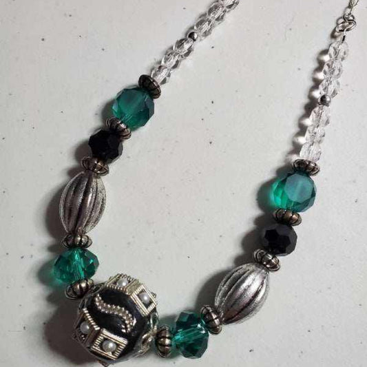 Vintage fashion inspired teal, black, and silver statement necklace with glass, crystal, acrylic, and pewter beads on an 18-inch chain