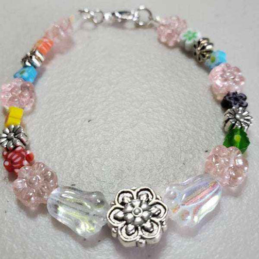 Handcrafted floral bracelet with Millefiori beads, pewter daisies, Czech glass, and lobster clasp