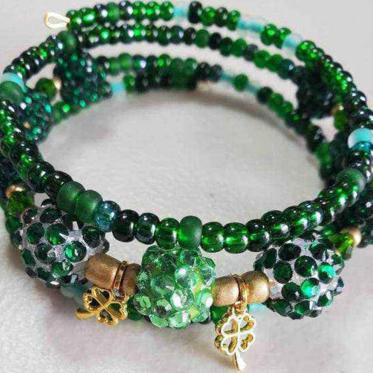 Bohemian cuff bracelet with green crystal beads and shamrock charms