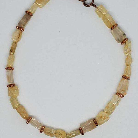 Gemstone bracelet with genuine citrine chips and copper spacers with lobster claw clasp