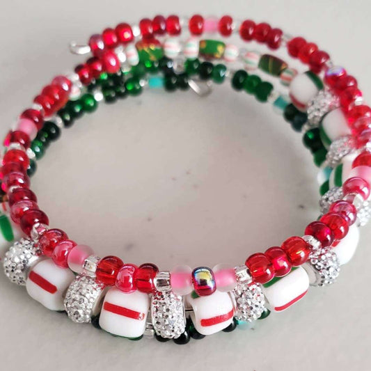 Peppermint Twist Cuff Bracelet with red and green Czech glass beads and rhinestone accents.