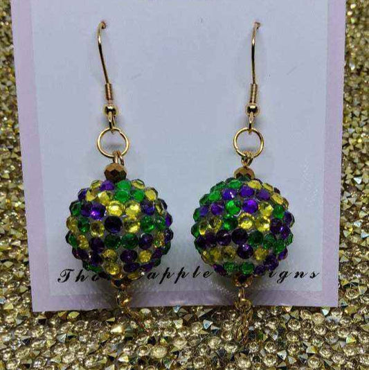 Colorful Mardi Gras earrings with green, purple, and gold gumball beads and gold dangle chains on nickel-free brass hooks